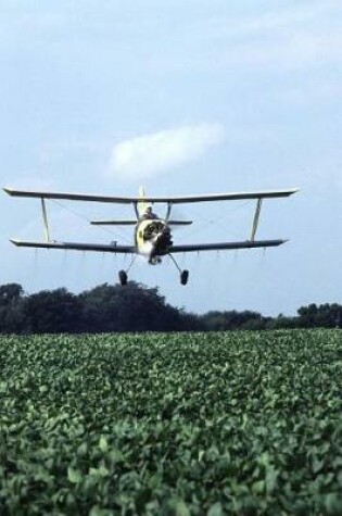 Cover of Science Theme Journal Plane Flies Over Farm Field