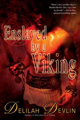 Book cover for Enslaved by a Viking