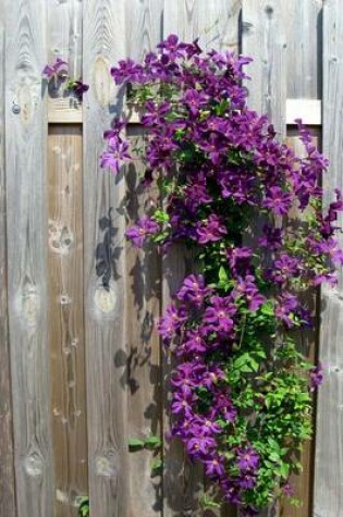 Cover of Clematis on a Weathered Wooden Fence Flower Journal