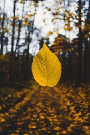 Cover of A Yellow Leaf of Autumn Floating Down in the Woods