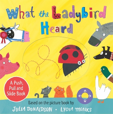 Book cover for What the Ladybird Heard: A Push, Pull and Slide Board Book