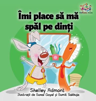 Book cover for I Love to Brush My Teeth (Romanian children's book)