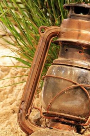 Cover of An Antique Rusted Lantern Left at the Beach