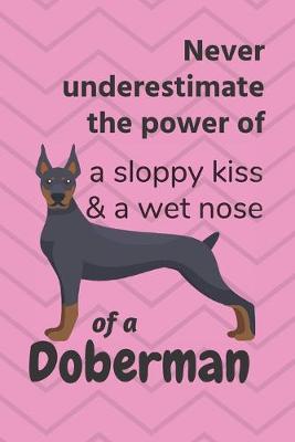 Book cover for Never underestimate the power of a sloppy kiss & a wet nose of a Doberman