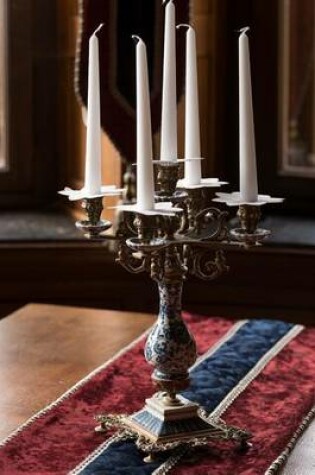 Cover of Candelabra and Candle on a Table with Runner