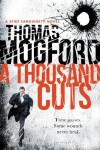 Book cover for A Thousand Cuts