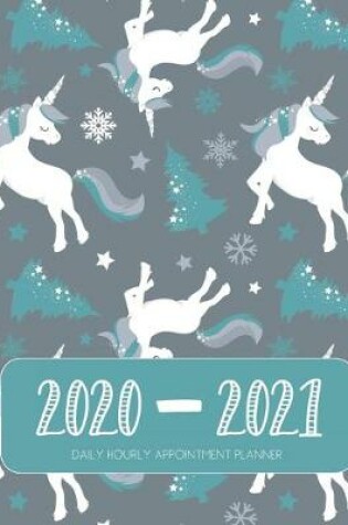 Cover of Daily Planner 2020-2021 Christmas Unicorn 15 Months Gratitude Hourly Appointment Calendar