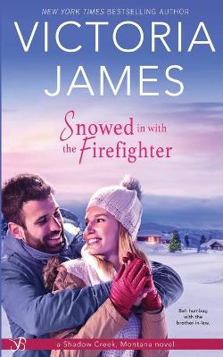 Book cover for Snowed in with the Firefighter