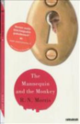 Book cover for The mannequin and the monkey