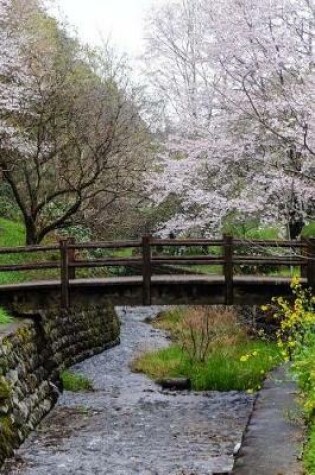 Cover of Trees Full of Cherry Blossoms and a Foot Bridge in Japan Journal