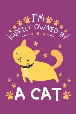 Book cover for I'm happily owned by a cat