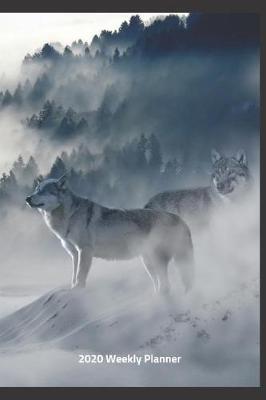 Book cover for Plan On It 2020 Weekly Calendar Planner - Wolves On A Snowy Day
