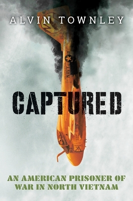 Book cover for Captured: An American Prisoner of War in North Vietnam (Scholastic Focus)