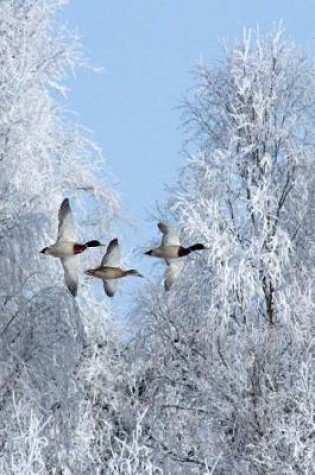 Cover of Three Geese Flying South Through a Snow Covered Forest Journal