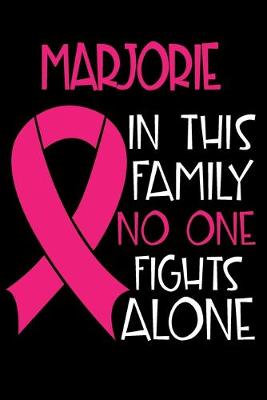 Book cover for MARJORIE In This Family No One Fights Alone