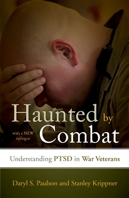 Book cover for Haunted by Combat