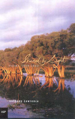 Book cover for Skinned By Light: Selected Poems