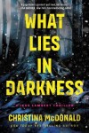 Book cover for What Lies in Darkness