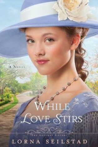 Cover of While Love Stirs – A Novel