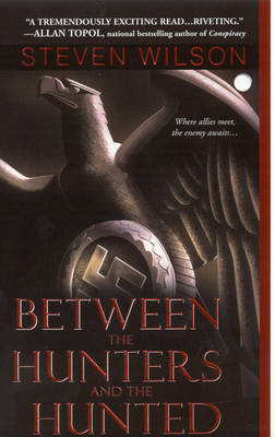 Book cover for Between the Hunters and the Hunted