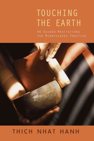 Book cover for Touching the Earth