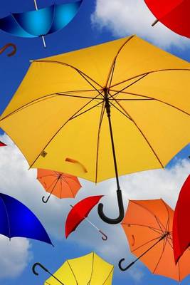 Book cover for Colorful Umbrellas Clustered Together in the Air