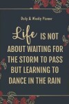 Book cover for Daily & Weekly Planner - Life is not about waiting for the storm to pass but learning to dance in the rain