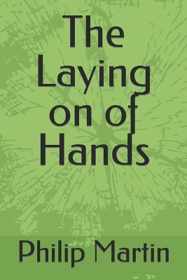 Book cover for The Laying on of Hands