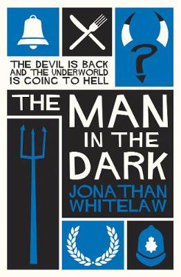 Book cover for The Man in the Dark