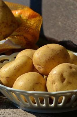 Book cover for Unpeeled Potatoes Harvested and Cleaned Journal