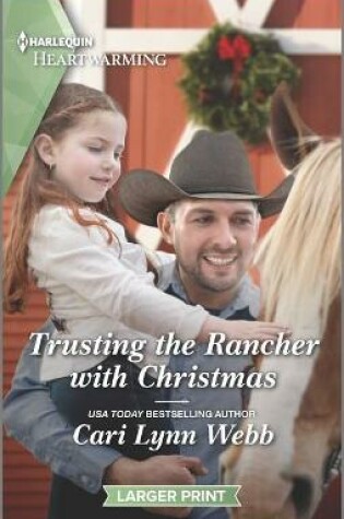 Cover of Trusting the Rancher with Christmas