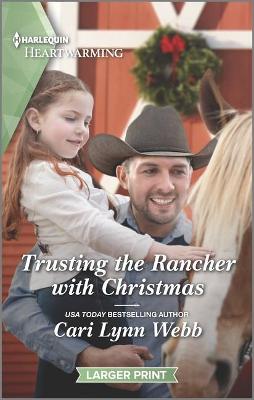 Book cover for Trusting the Rancher with Christmas