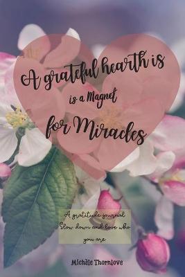 Book cover for A grateful hearth is a magnet for miracles