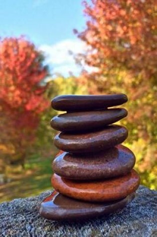 Cover of Zen Cairn Stack of Smooth Stones in the Fall Woods