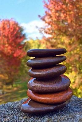 Book cover for Zen Cairn Stack of Smooth Stones in the Fall Woods