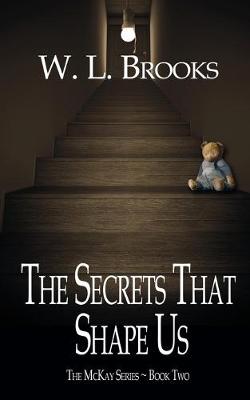 Book cover for The Secrets That Shape Us