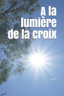 Book cover for A la lumiere de la croix