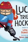 Book cover for Lucy Tries Hockey