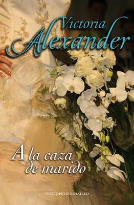 Book cover for A la caza de marido