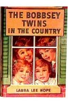 Book cover for The Bobbsey Twins in the Country