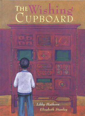 Book cover for The Wishing Cupboard