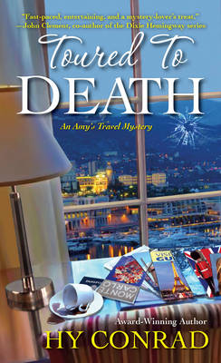 Book cover for Toured To Death