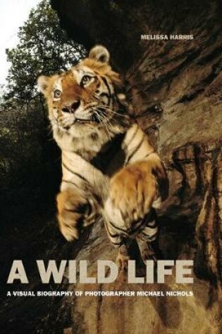 Cover of A Wild Life: A Visual Biography of Photographer Michael Nichols (Signed Edition)