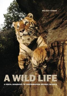 Book cover for A Wild Life: A Visual Biography of Photographer Michael Nichols (Signed Edition)