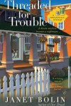 Book cover for Threaded for Trouble