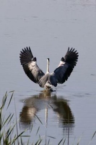 Cover of Cool Blue Heron Spreading Its Wings to Fly Bird Journal