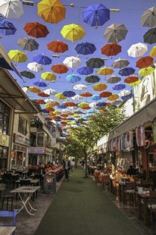 Cover of Colorful Umbrellas Suspended Over a Cafe