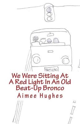 Book cover for We Were Sitting At A Red Light In An Old Beat-Up Bronco