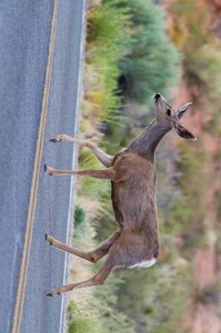 Cover of A Mule Deer Quickly Crossing the Road