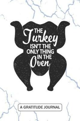 Cover of The Turkey isn't the Only Thing in the Oven - A Gratitude Journal